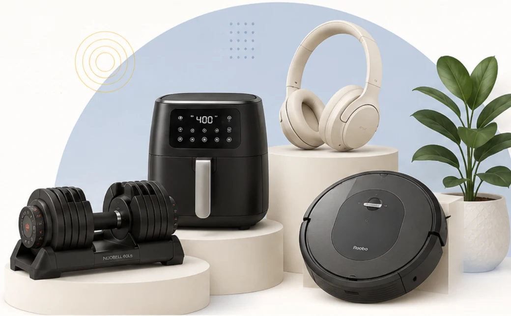 Products we compare - an air fryer, adjustable dumbbell, headphones and a robot vacuum arranged on display pedestals